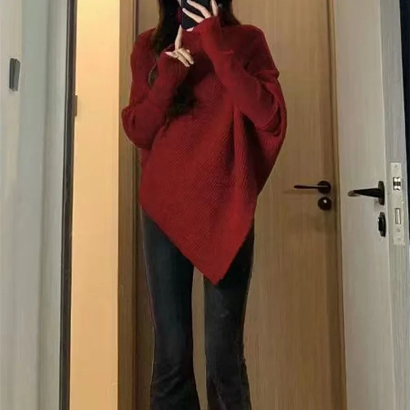 

Irregular niche design sense sweater woman autumn and winter lazy wind soft glutinous knit top thickened