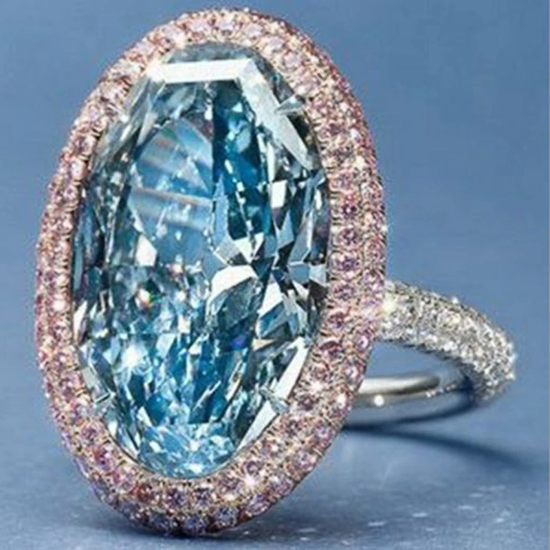 

Hyperbole Oval Sky Blue Cubic Zirconia Rings Paved Pink CZ Gorgeous Women Wedding Ceremony Party Ring New Trendy Jewelry