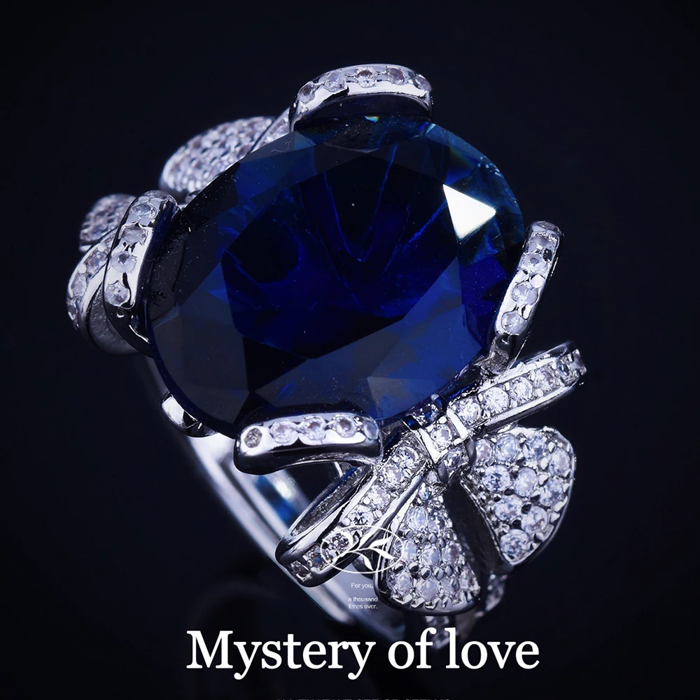 

Женское кольцо с бантом и имитацией сапфира, с цирконом