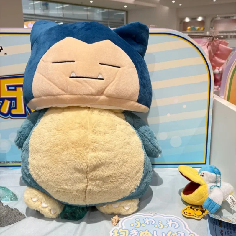 Фото Новая серия плюшевых головных уборов-капелюхов PokéMon: Снорлакс, Саблай, Мирайдон. Мультяшные плюшевые шапки-капюшоны, коллекционные украшения, игрушки. №3