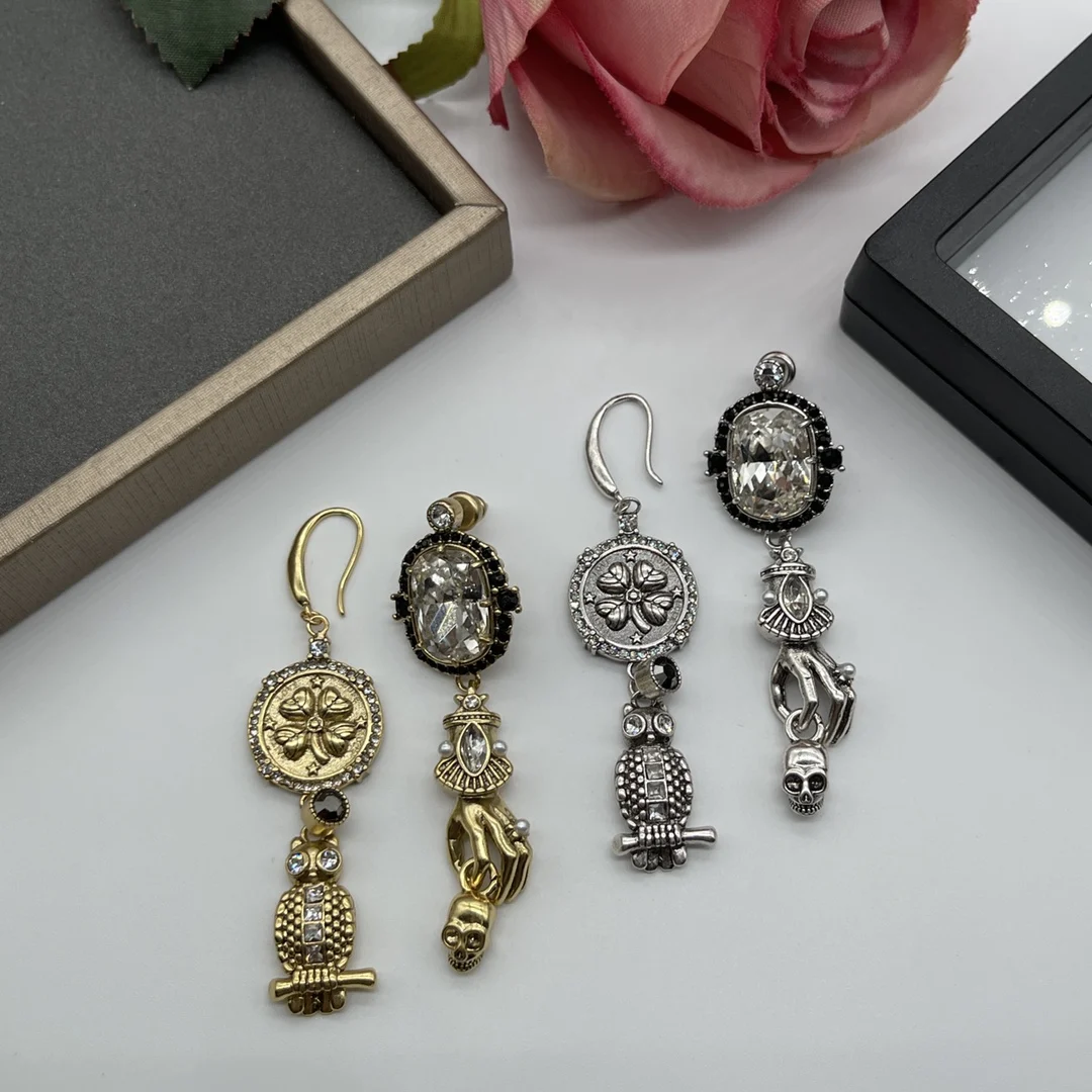 

Personality Fashion Owl Palm Asymmetrical Earrings