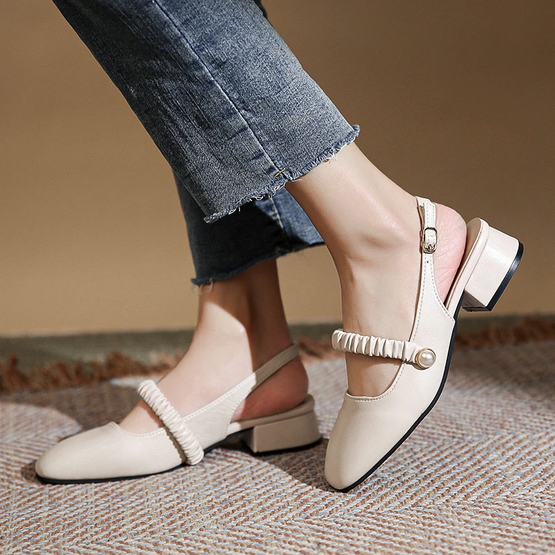 

Fairy style Baotou sandals 2022 summer new pearl thick heel medium heel all-match gentle Mary Jane one word buckle sandals