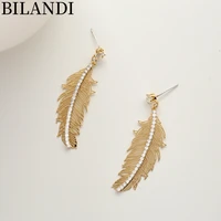 bilandi fashion jewelry metal feather earrings 2022 new trend high quality shiny crystal drop earrings for girl