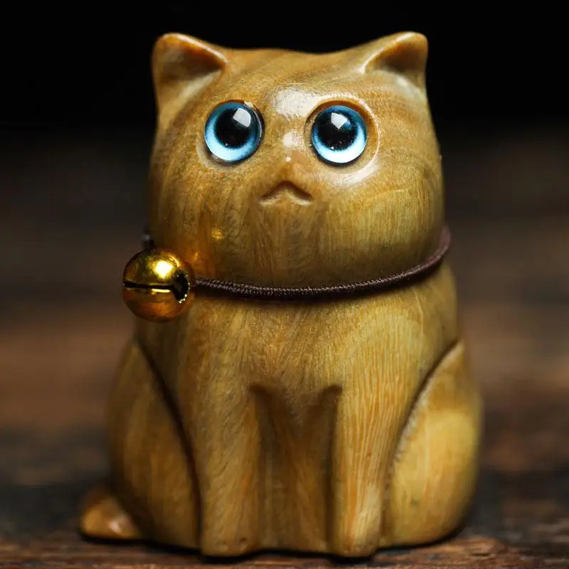 

Деревянная статуэтка кошки