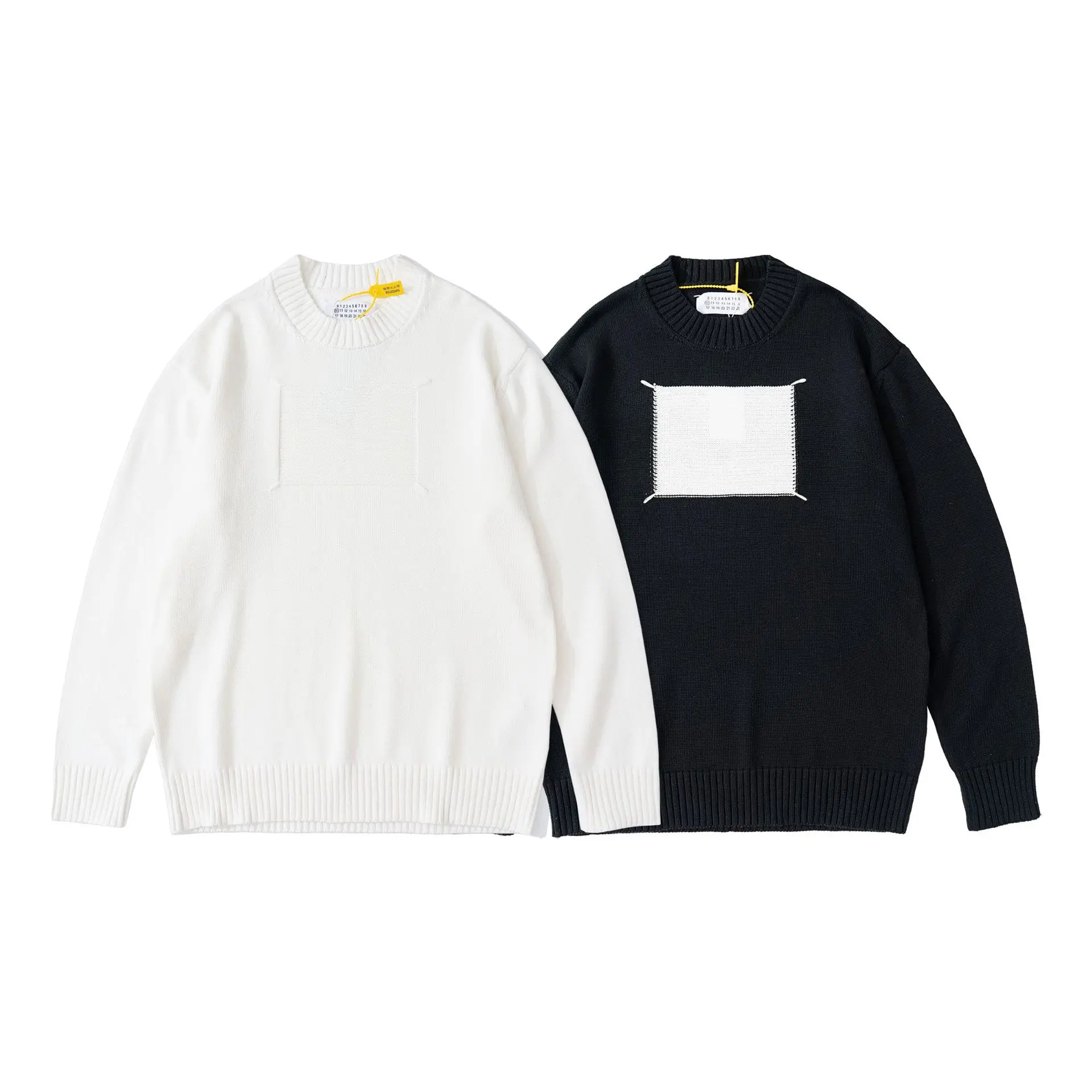 

Maison Margiela Sweaters Men and Women 22SS New MM6 Women's Ripped Black White Stitching Four Corners Baggy Sweater Pullover