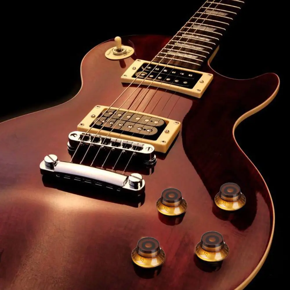 Тембр звучания электрогитары. Тембры электрогитары. Человек перебирает струны. Тембры электрогитары. Бас-гитара музыкальный инструмент.