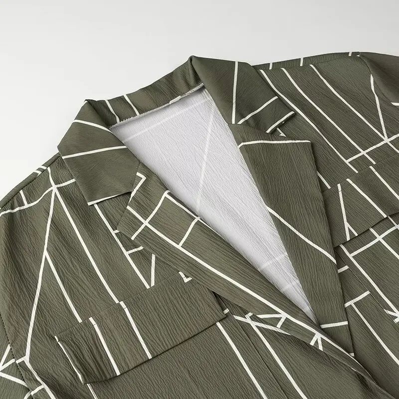 Женский брючный костюм с широкими штанинами и молнией геометрическим принтом