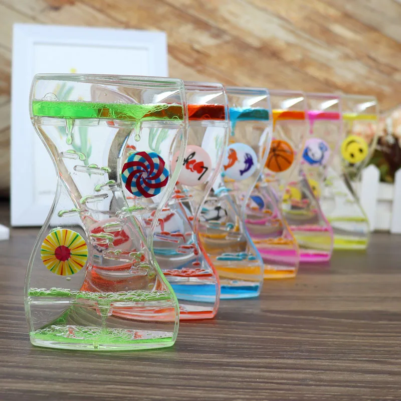 Купи Double Heart Liquid Hourglass Acrylic Bubble Moving Drip Oil Timer Clock Ornaments Liquid Floating Hourglass Home Office Decor за 734 рублей в магазине AliExpress