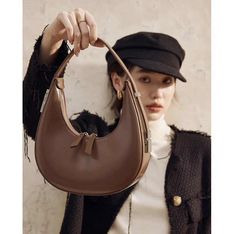 Кожаная дизайнерская сумка с высококачественной легкой роскошной сумкой в форме