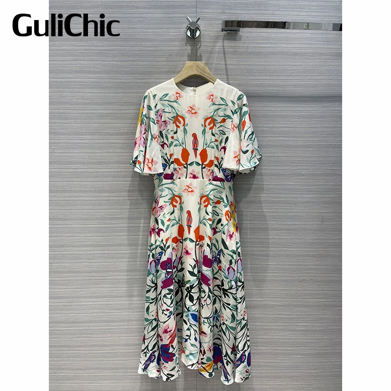 

Женское винтажное шелковое платье-миди с цветочным принтом и круглым вырезом