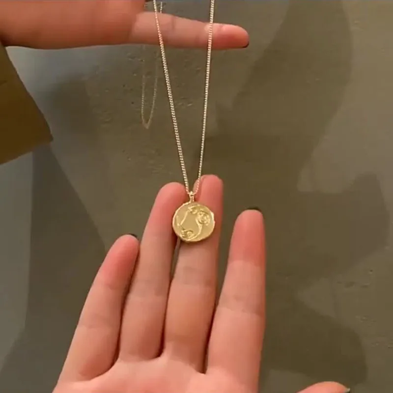 

Trend Fashion Silver Abstract Face Round Best-selling Pendant Necklace For Women Sweater Chain Jewelry Wholesale