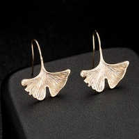 copper plated 14k real gold color preserving simple dolphin ginkgo leaf earrings female korean version gentle fairy college