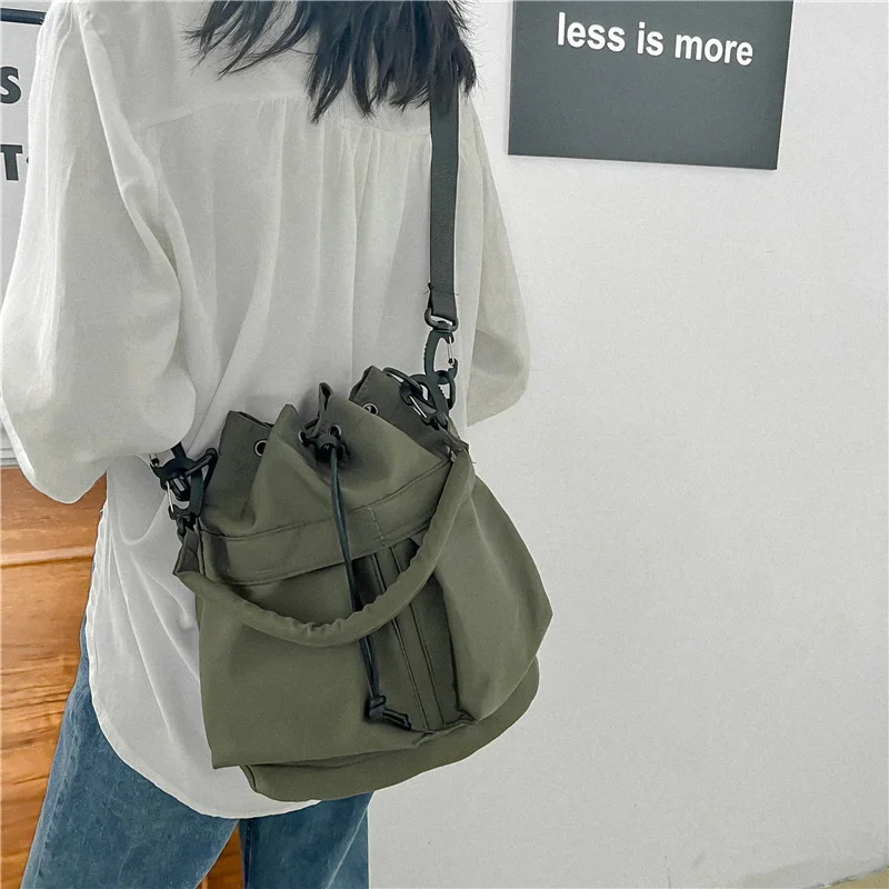 

New Drawstring Waterproof Nylon Bucket Bag Niche Personality Large Capacity Portable Sports Shoulder Crossbody Bag