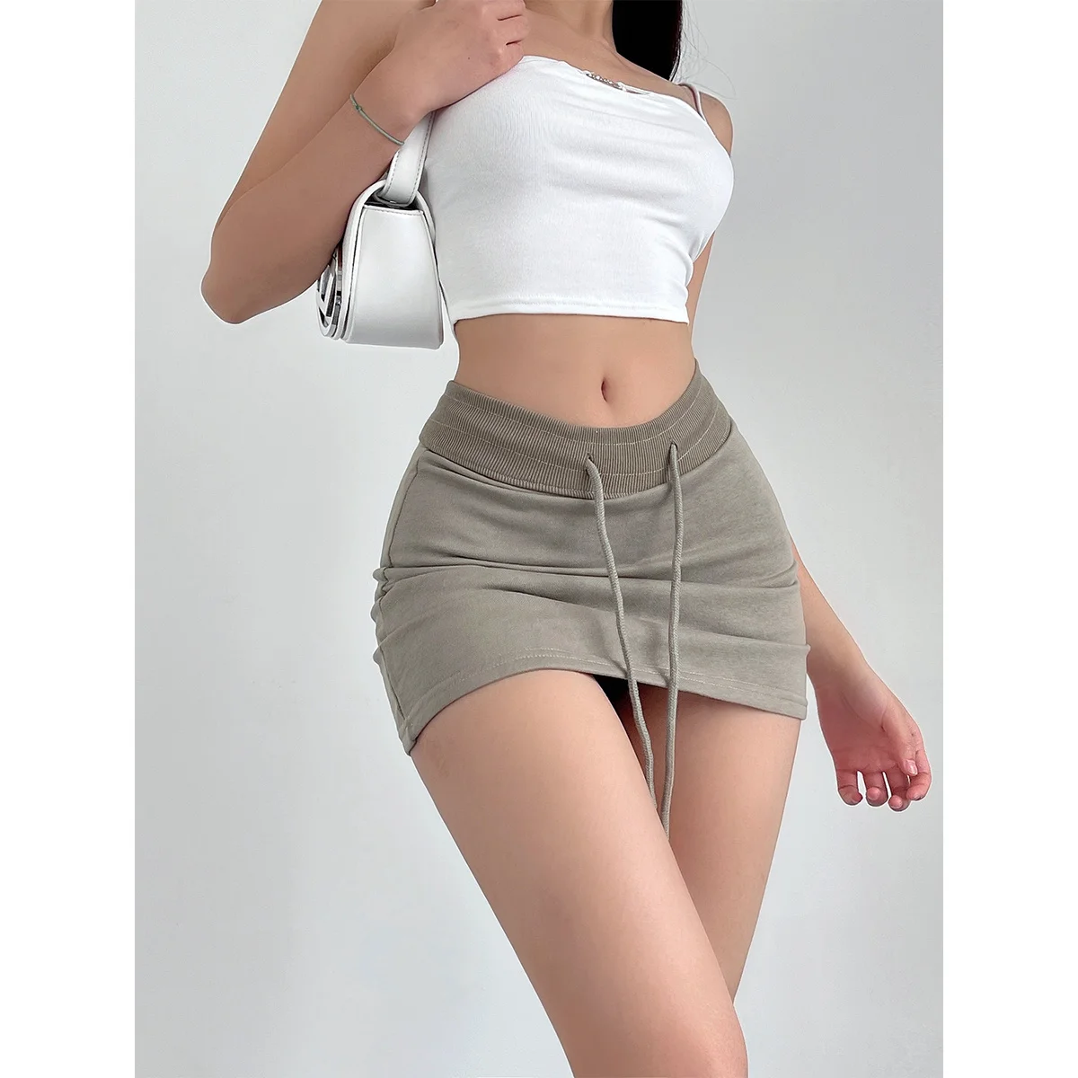 

Юбка женская трапециевидная на шнуровке, Спортивная облегающая короткая юбка с эластичным поясом, пикантная в Корейском стиле, одежда для девушек, лето BIT2