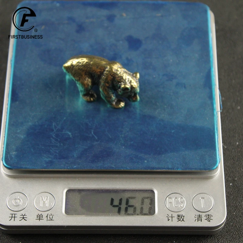 

Латунная миниатюра медведя