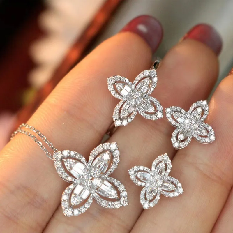 

CARLIDANA 3pcs Set Luxury Silver Crystal Four Leaf Clover Earring Ring Necklace 3A Zircon Flower Fashion Jewelry for Women Party