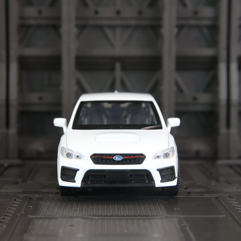 Фото Модель автомобиля Subaru WRX STI из сплава, масштаб 1:30, с открывающимися дверями, капотом и багажником, со звуковыми и световыми эффектами, в комплекте с подарками. №1