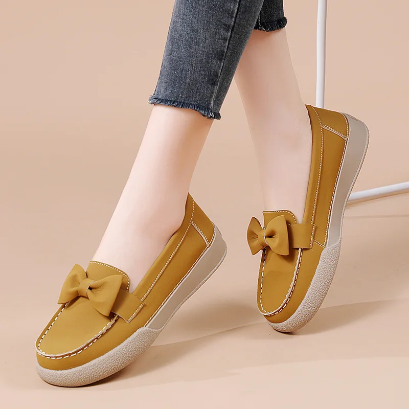 

New female flat shoes female light mouth flat heel fairy wind grandma shoes soft sole big bow work bean shoes