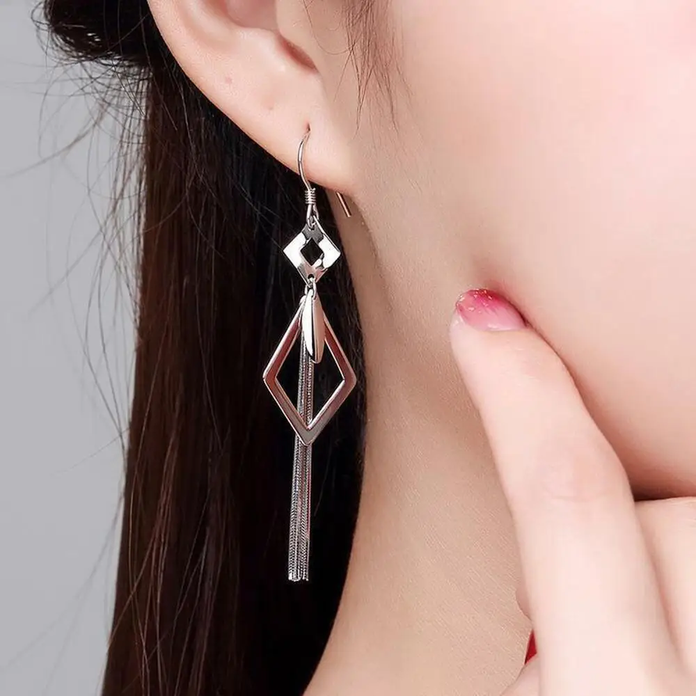 

Женские длинные серьги-подвески из серебра пробы