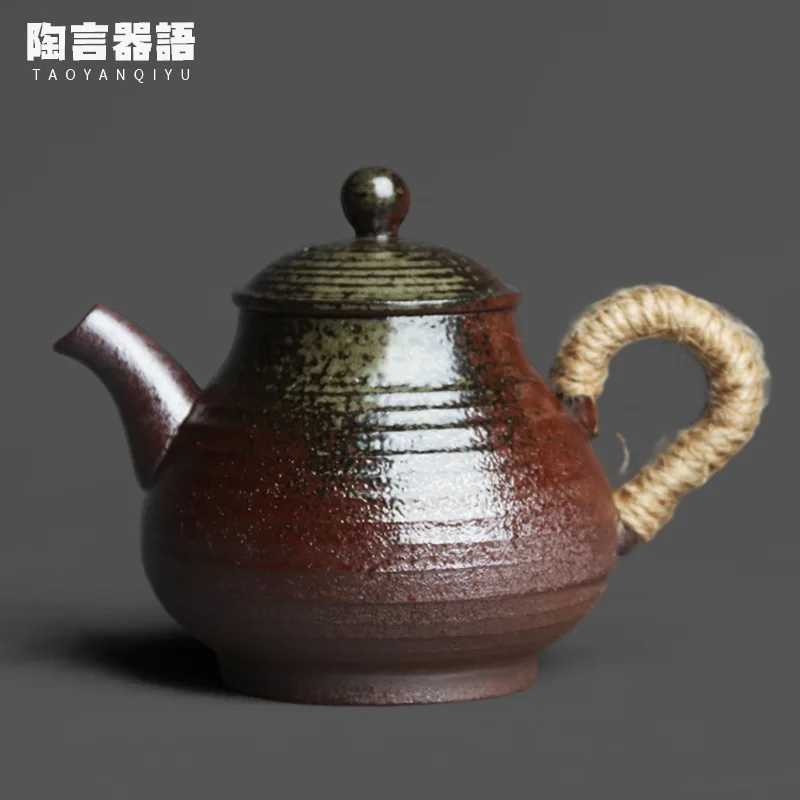 

Rock mine pottery kiln baked firewood fire marks glaze pear-shaped hand-held teapot old rock mud material kung fu tea ceremony t