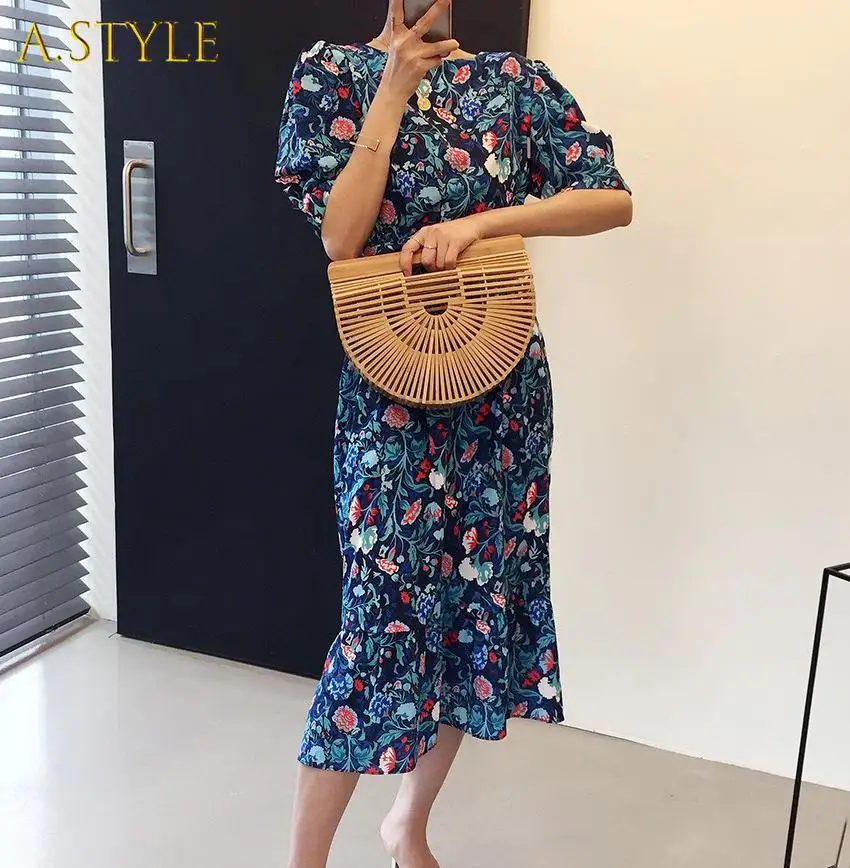 

Платье-миди с открытой спиной, пышными рукавами и цветочным принтом