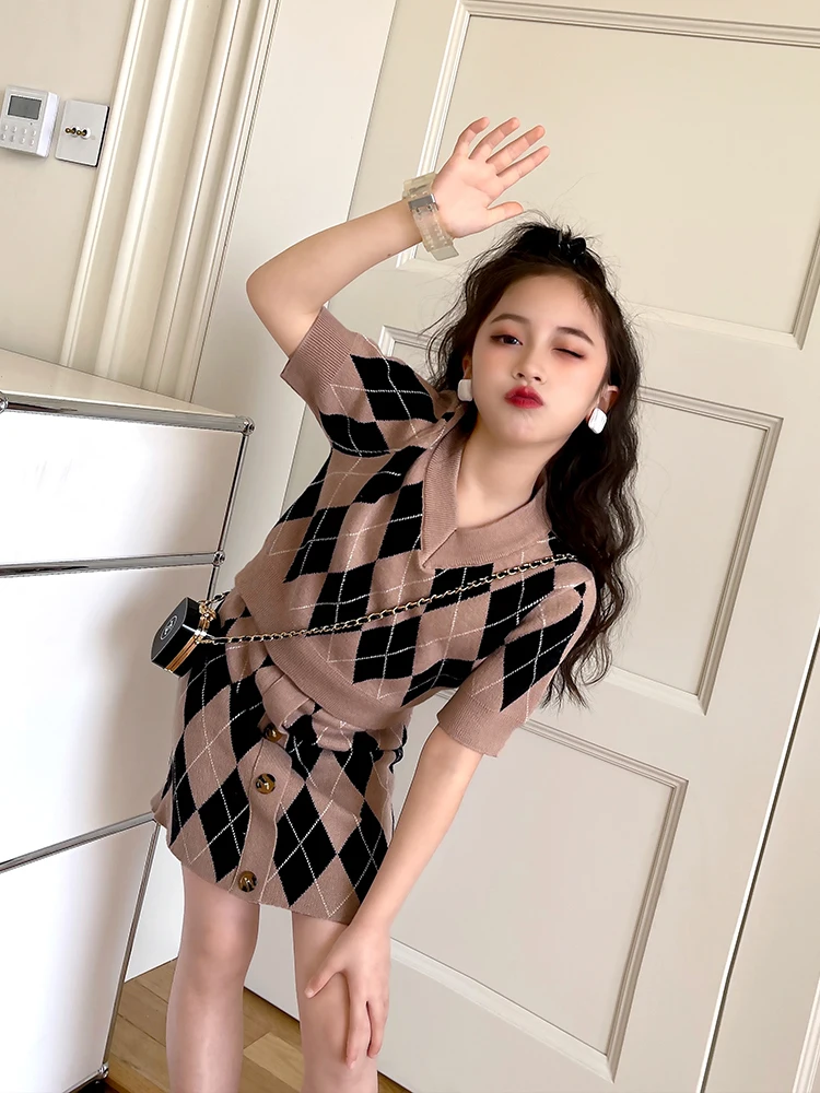 

Girls plaid suit 2022 spring and summer new pullover knitted short-sleeved top high waist slim fit slim A-line skirt