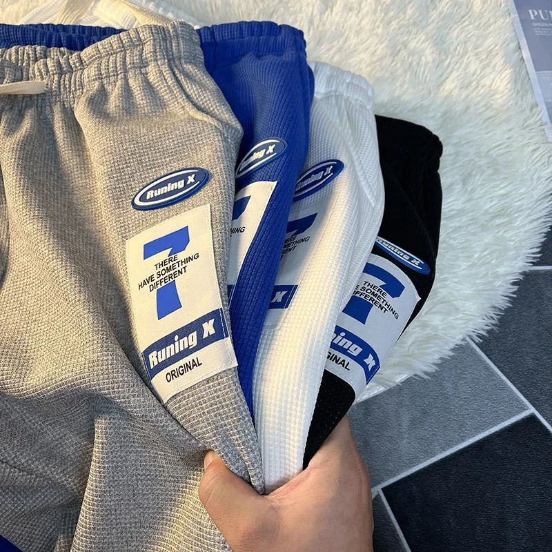 Новинка весна-лето 2023 штаны для бега с вафельным узором мужская мода брендовые