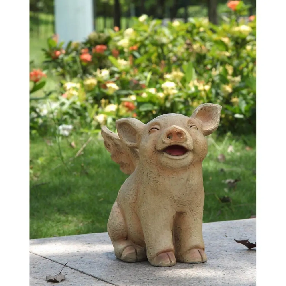 

LTD. LAUGHING PIG WITH WINGS SITTING