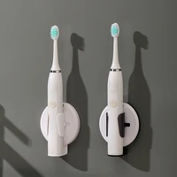 2pcs electric toothbrush holder for home washroom wall mounted traceless stand bracket toothbrush organizer brush holder base
