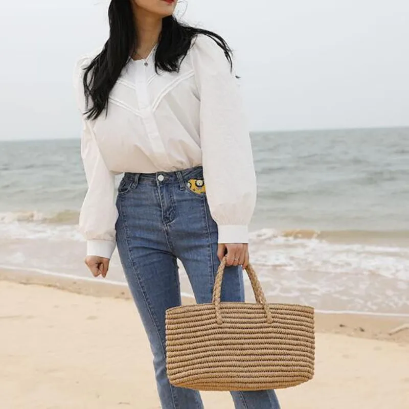 2022 new straw bag handmade woven portable vegetable basket women's large capacity seaside sand |