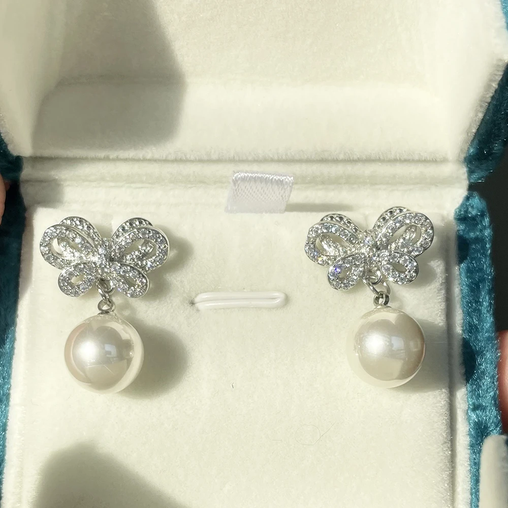 

Fashion Modern Bow Tie Design AAA CZ Shell Pearl Drop Earrings for Women Jewelry Accessories Sparkling Bridesmaid Wedding Gift