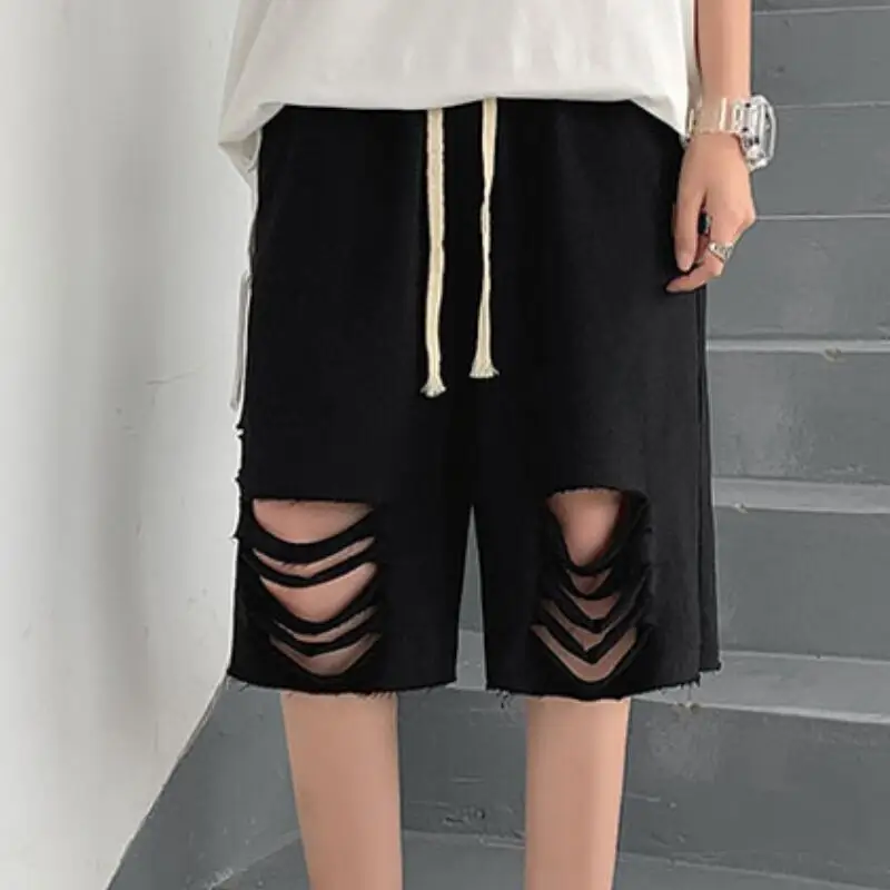 

Summer Men's New Fashion Personality Custom Plus Size Wild Torn Edge Design Fake Two-piece Casual Pants 27-42