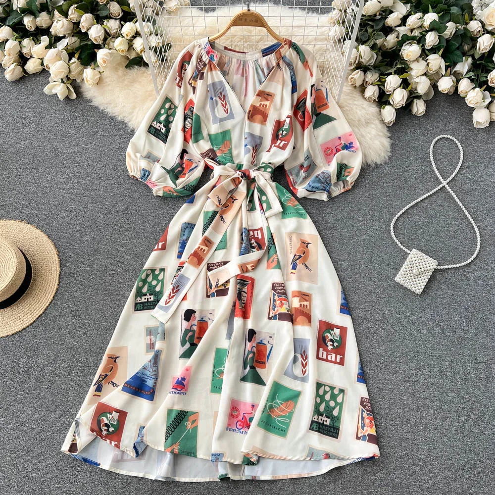 

Spring and summer new European and American holiday style V-neck strapped lantern sleeves mid-length printed dress
