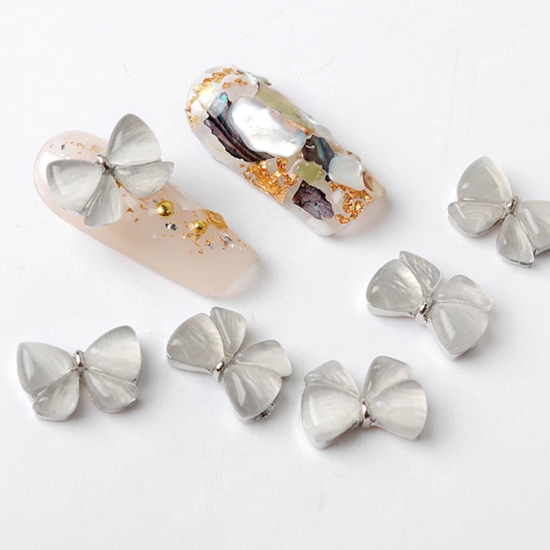 

10pcs, Nail Art Cat's Eye Bow Fritillary Bow Delicate Texture Nail Decoration Zircon Rhinestones For Nail Tips Decorations