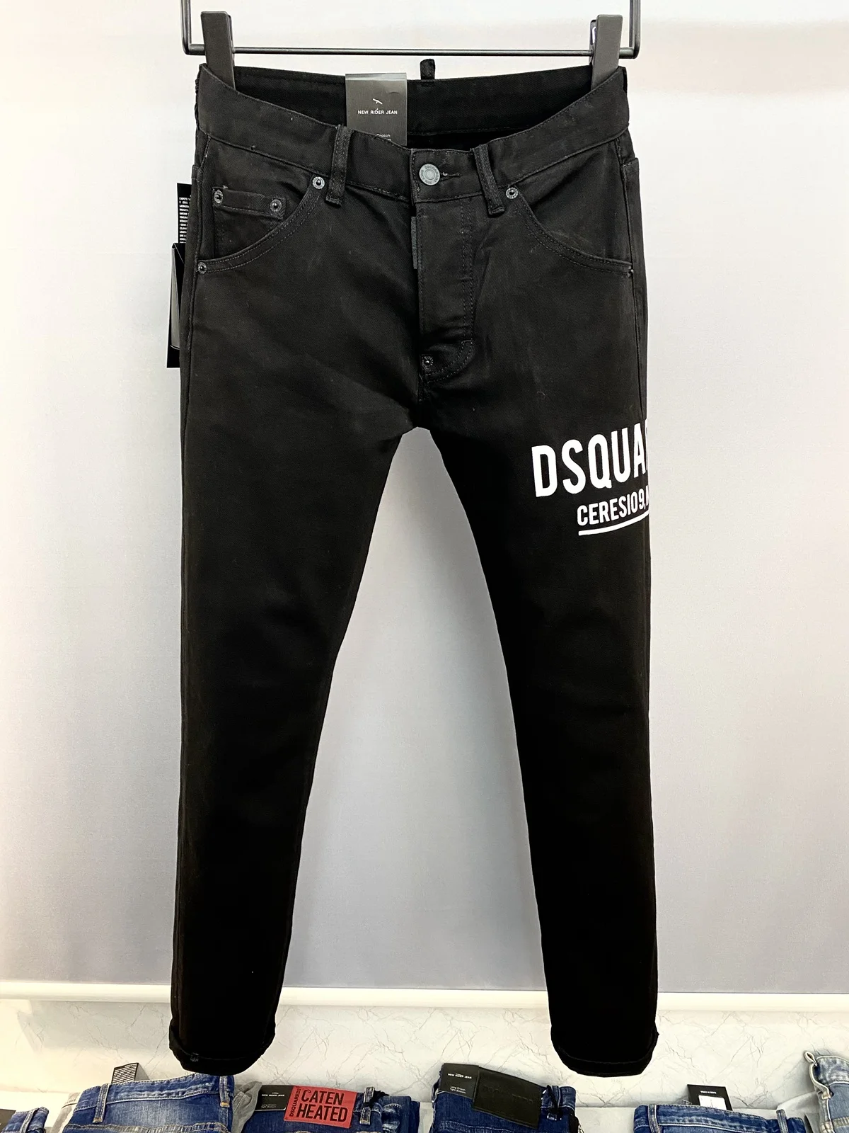 

DSQ D2 Women's/Men's Skinny Jeans With Ripped Holes elastic Paint Spray Stitching Beggar Pants