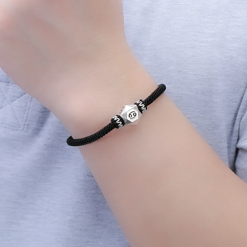 Серебряный браслет с подвеской зодиака из черной веревки