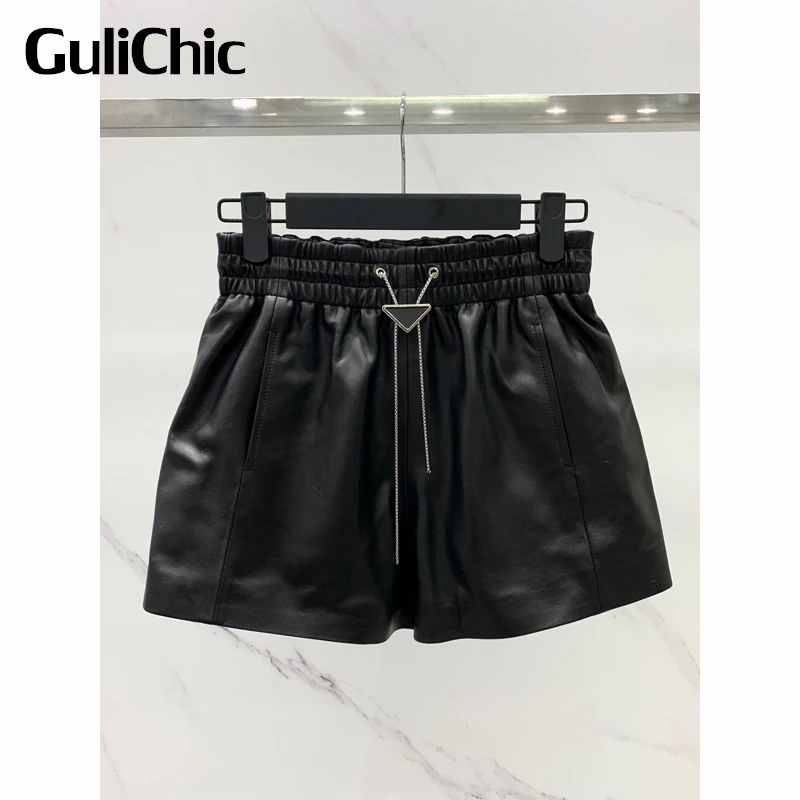 

11.15 GuliChic Women Loose Casual Elastic High Waist Triangle Chain Black Genuine Leather Shorts
