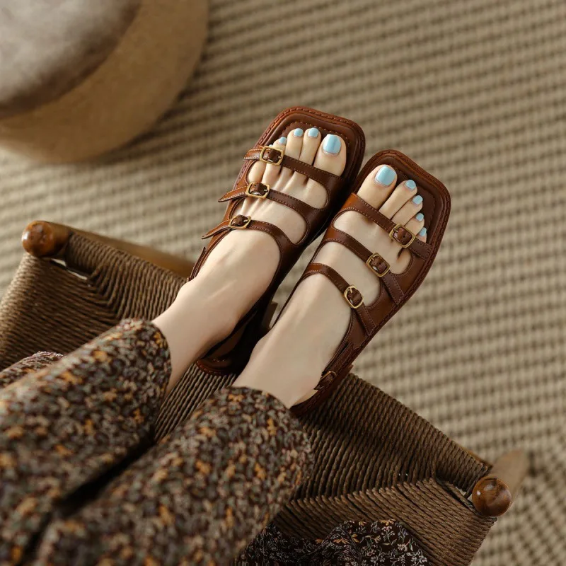

Wearing flat bottomed summer brown French sandals, soft leather fashion sandals