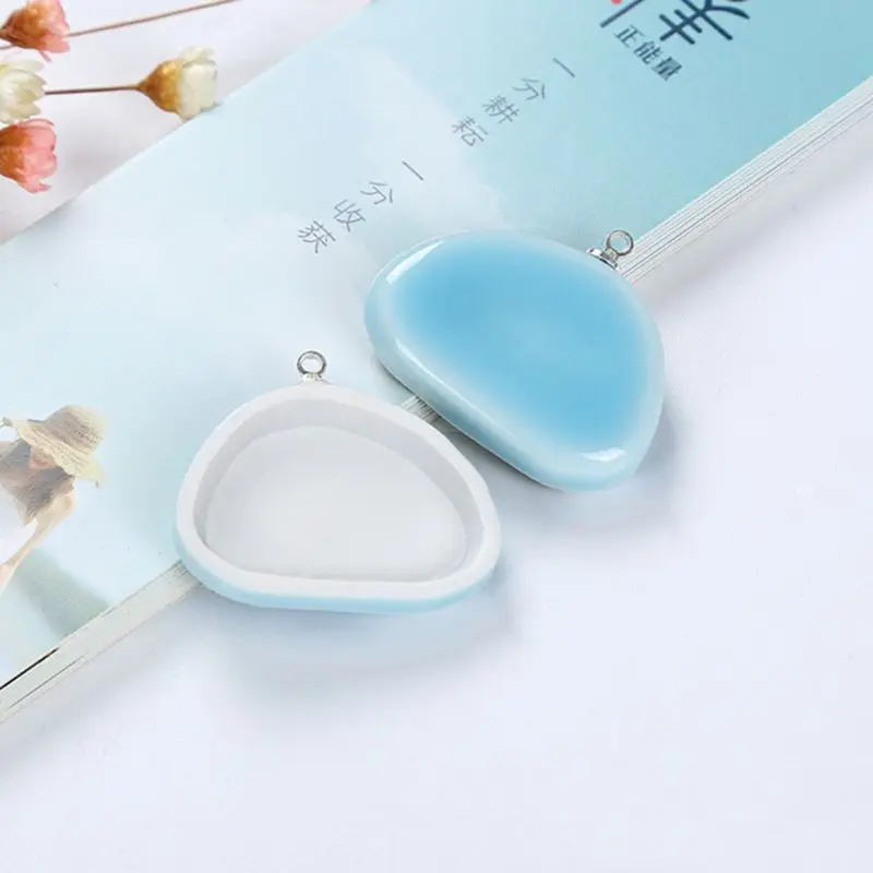 

Blank Epoxy Resin Trays Pendant Ceramic Necklace Pendant Keychain