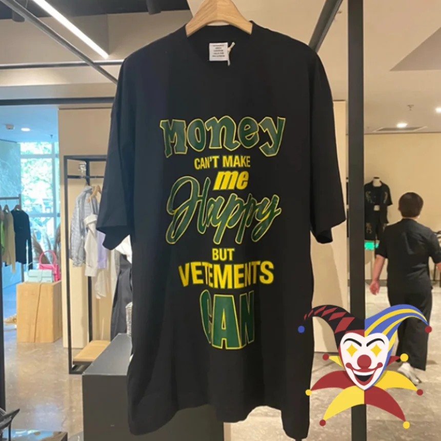 

Мужская и женская футболка оверсайз с надписью «Money Can't Make Me Happy But Vetement Can»