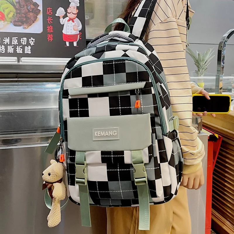 

2023 New Tartan schoolbag female Harajuku Ulzzang Junior High School University Birthday Department large capacity backpack