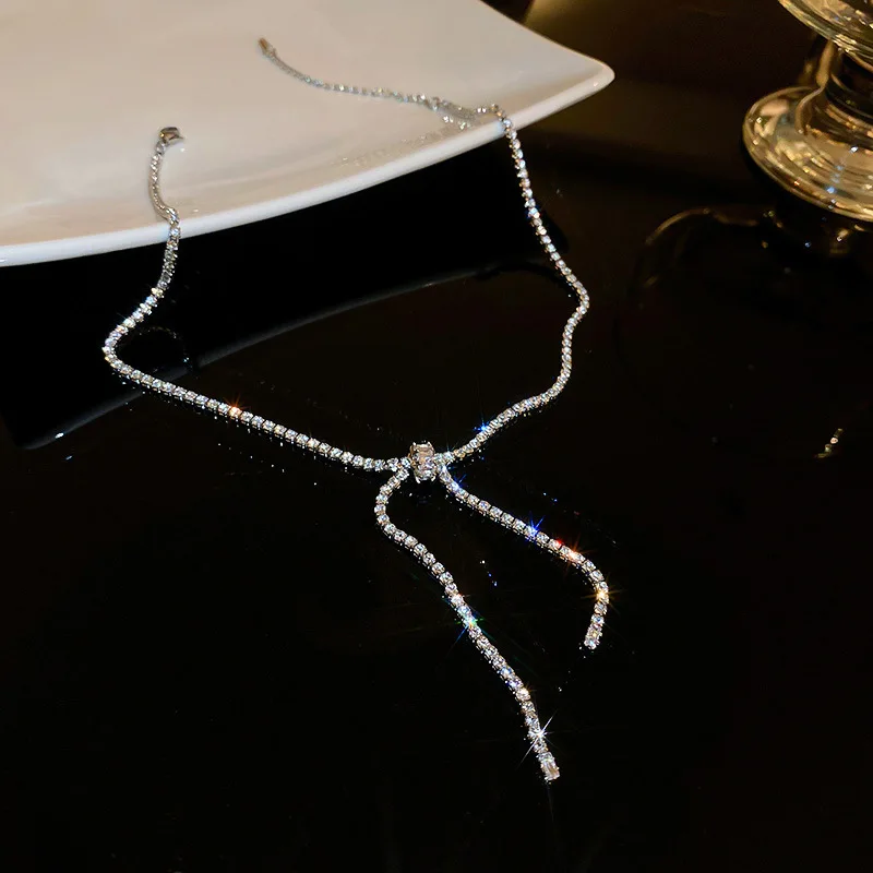 

Роскошное простое блестящее женское ожерелье-чокер с переплетенным бантом и кисточкой, новое модное изысканное ювелирное изделие, подарок ...