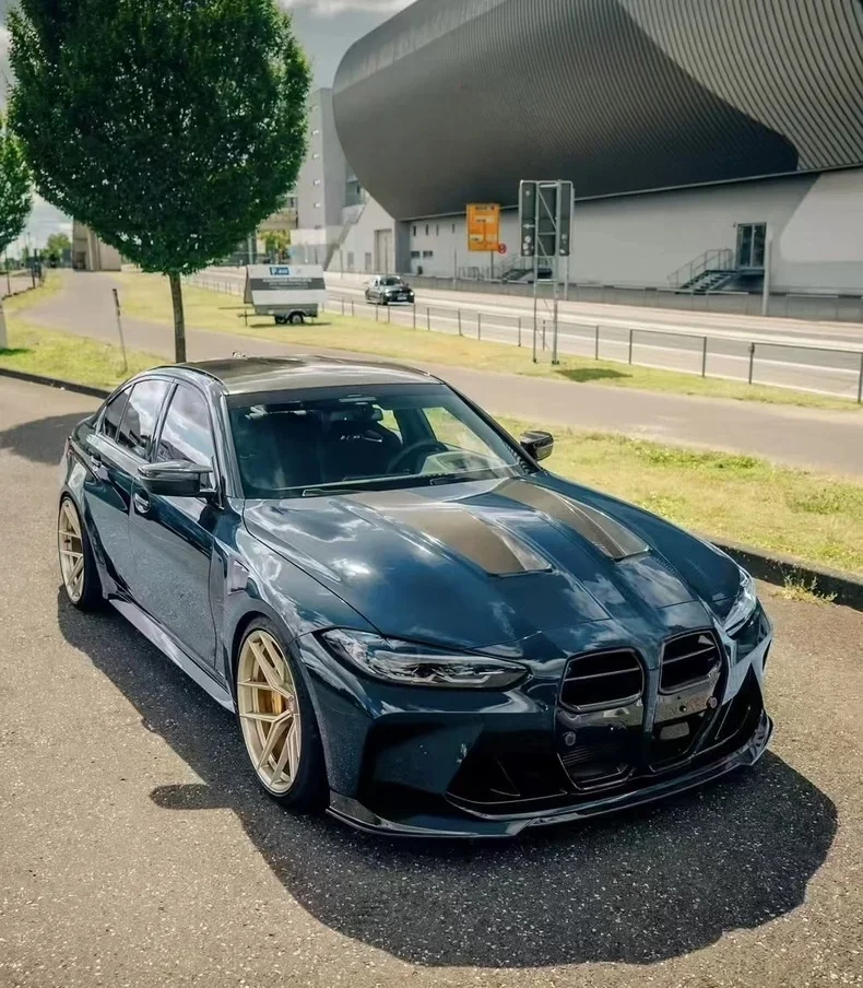 Фото Капот из сухого карбона в стиле CSL для G80 M3 G82 M4, карбоновый обвес для двигателя. №3