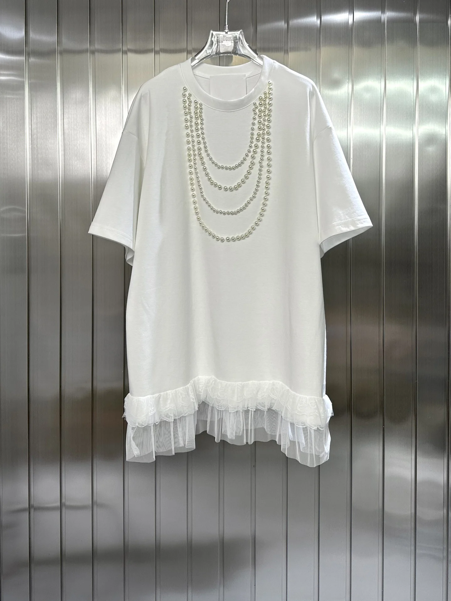 Short-sleeved dresses with pearl look great on their own or as oversized T-shirts5.29