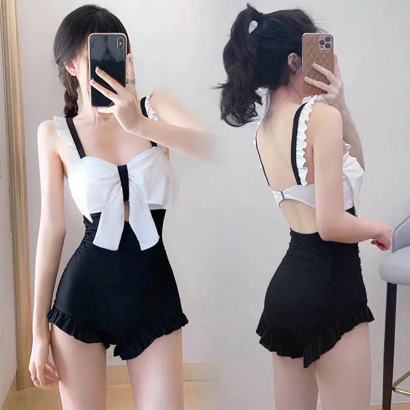

New swimsuit one-piece ruffle professional swimsuit butterfly dew back hot spring