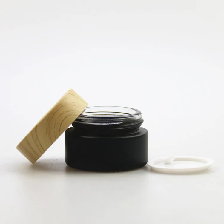 Матовая мерная банка для крема с пластиковой крышкой из зернистой древесины
