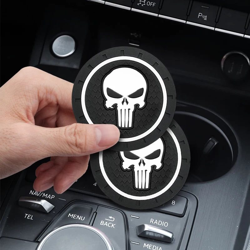 

1/2pcs Car Coaster Skull Logo Emblem Badge Water Cup Slot Non-Slip Silicone Pad Holder Mat Car Styling Accessories