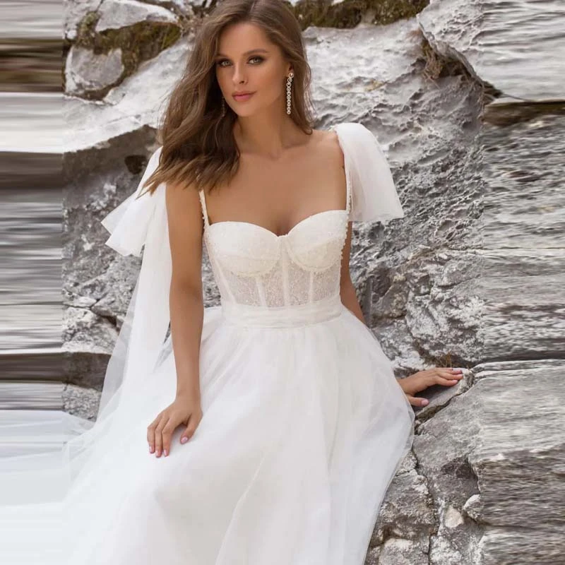 

Pretty White Spaghetti Strap Soft Tulle Bridal Dress 2022 Glitter Sequins Illusion A-Line Long Wedding Dresses Vestito da sposa