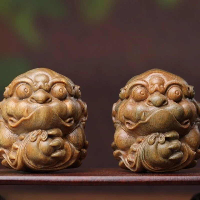 

Green sandalwood carving hand a piece of ingot treasure pixiu wood carving arts and crafts ornaments Guan Gong Guanyin gifts