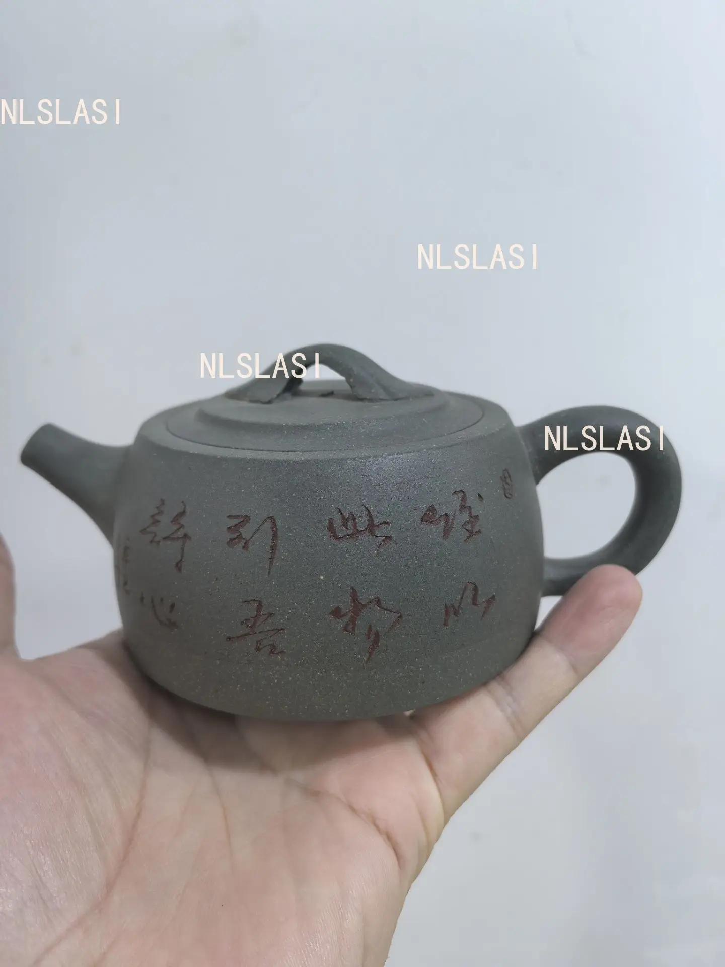 

Ручной чайник NLSLASI из фиолетовой глины 110 мл